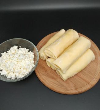 Млинці з сиром та родзинками