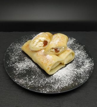 Млинці з сиром та родзинками