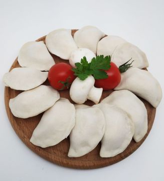 Вареники з тушкованою капустою та грибами