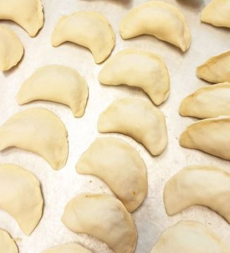 Вареники з тушкованою капустою