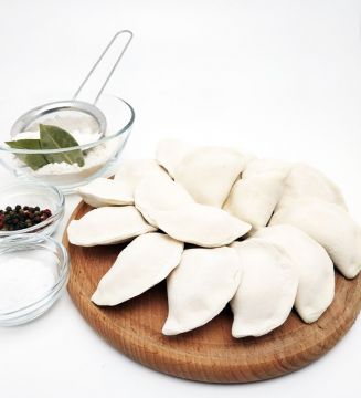 Вареники з тушкованою капустою